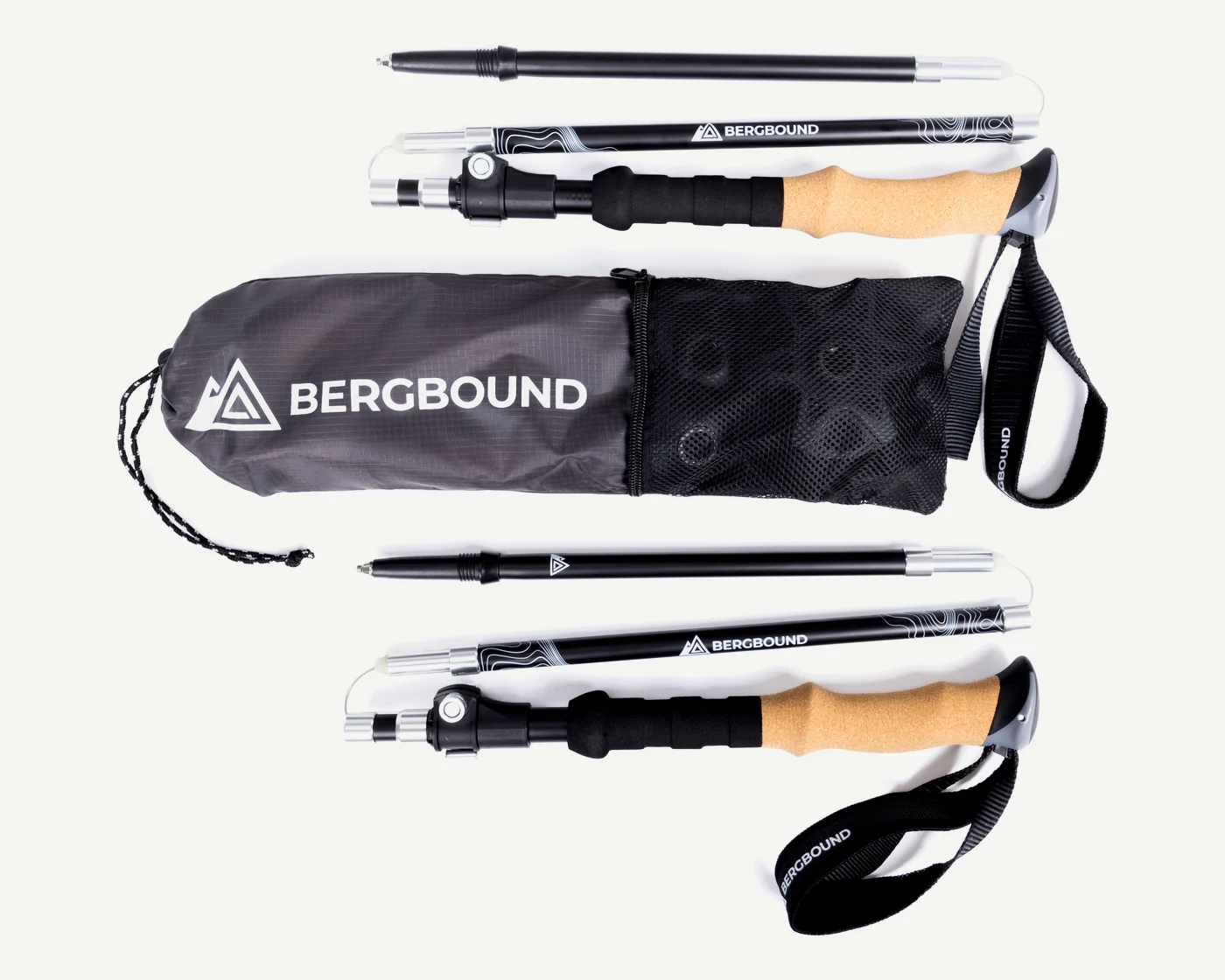 Folded BERGBOUND trekking poles next to the carry bag